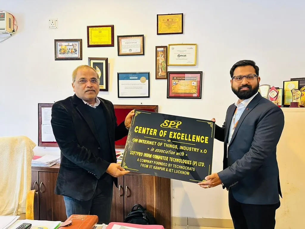 Er. Akhil Srivastava of Softpro India handing the Center of Excellence name plate to Bansal Director Dr. S. K. Agarwal