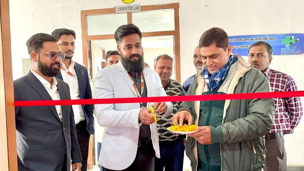 The Softpro India team with BSSITM Director Dr. Dhirendra Kumar at the ribbon cutting ceremony