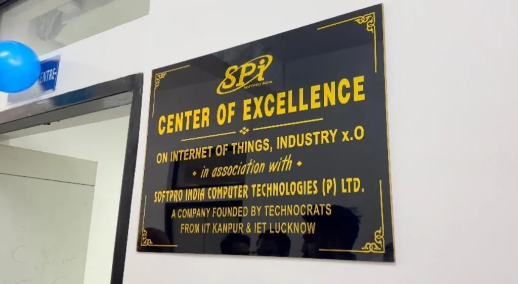 The Center of Excellence name plate mounted outside the 50-computer lab at BSSITM